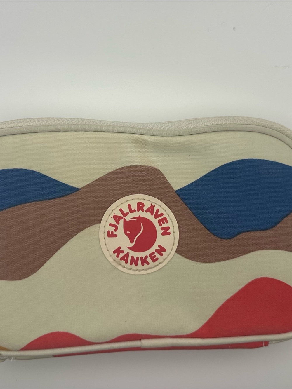 Fjallraven Kanken Zip travel wallet from the artist series in “Landscape”